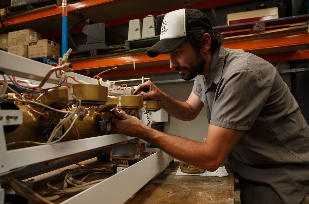 CAFFEINE FIX: Ross Ciavarella restores commercial coffee machines to their former glory. Pictures: Max Mason-Hubers