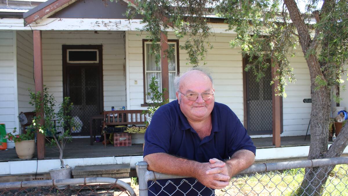 HUMBLE: Neville Lawrence OAM at his Torryburn home. He was awarded the honour for his service to the Gresford community. Photo: Michelle Mexon