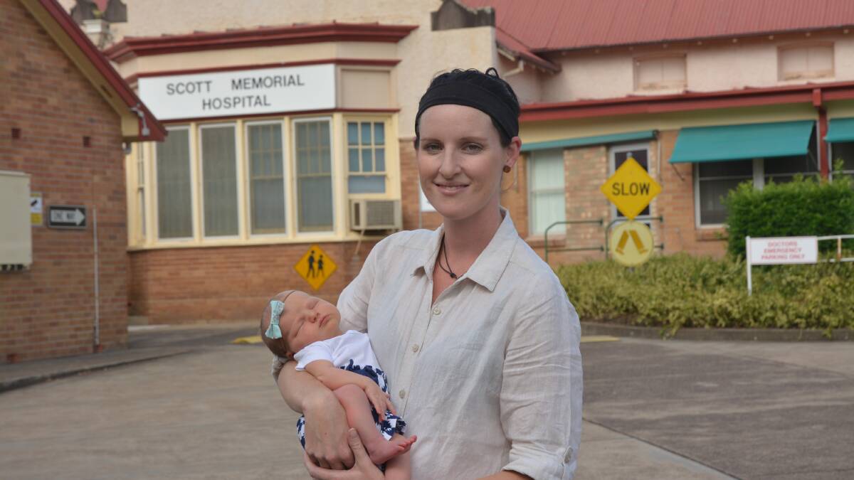 EXCITING: Sharna Parkinson outside Scone's Scott Memorial Hospital with daughter Elki on Tuesday afternoon.