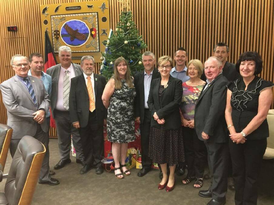 Give back: Lake Macquarie councillors open the mayor's Christmas appeal.