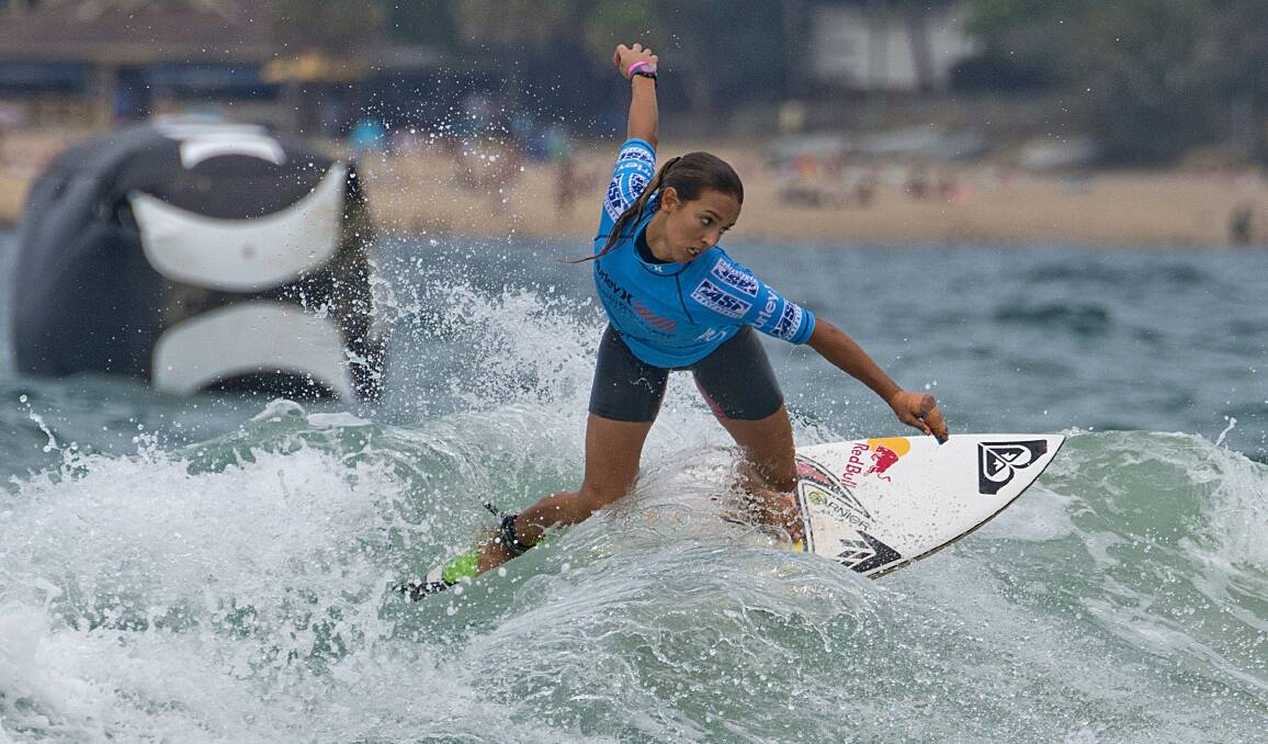 Fierce: World No.3 surfer Sally Fitzgibbons carves up the waves.
