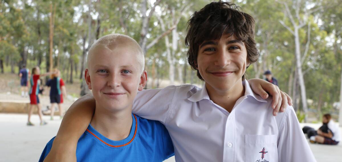 Mates: Issac Quinn and his classmate Danyon Blackeby, who inspired Issac to be brave and shave, not long after Danyon had done the same.