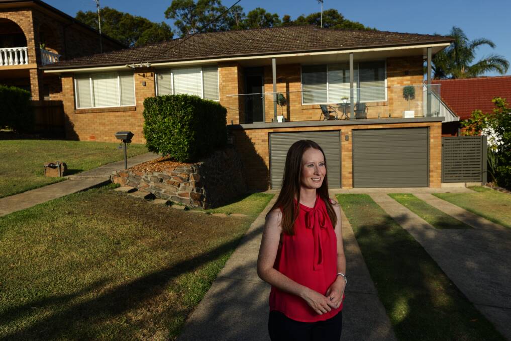ON THE RISE: Felicity Rose, outside of her home in Kahibah. Ms Rose and her partner bought in the suburb in 2011, and have seen the value of the property continue to grow ever since. PICTURE: Jonathan Carroll