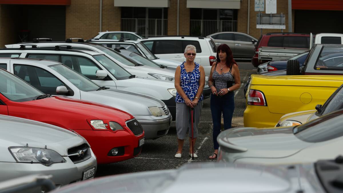 PARKED IN: Susan Hegarty (left) and Cherie Thompson say Maitland's parking situation is out of control. Picture: Jonathan Carroll.