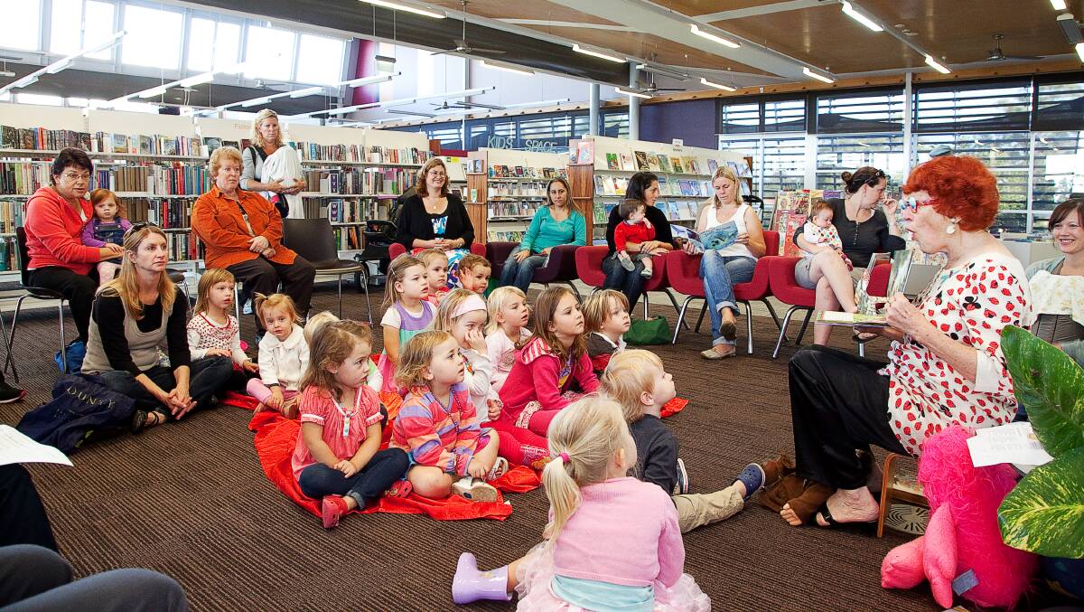 READ ALL ABOUT IT: Storytime at Swansea library before it was jazzed up for Christmas.