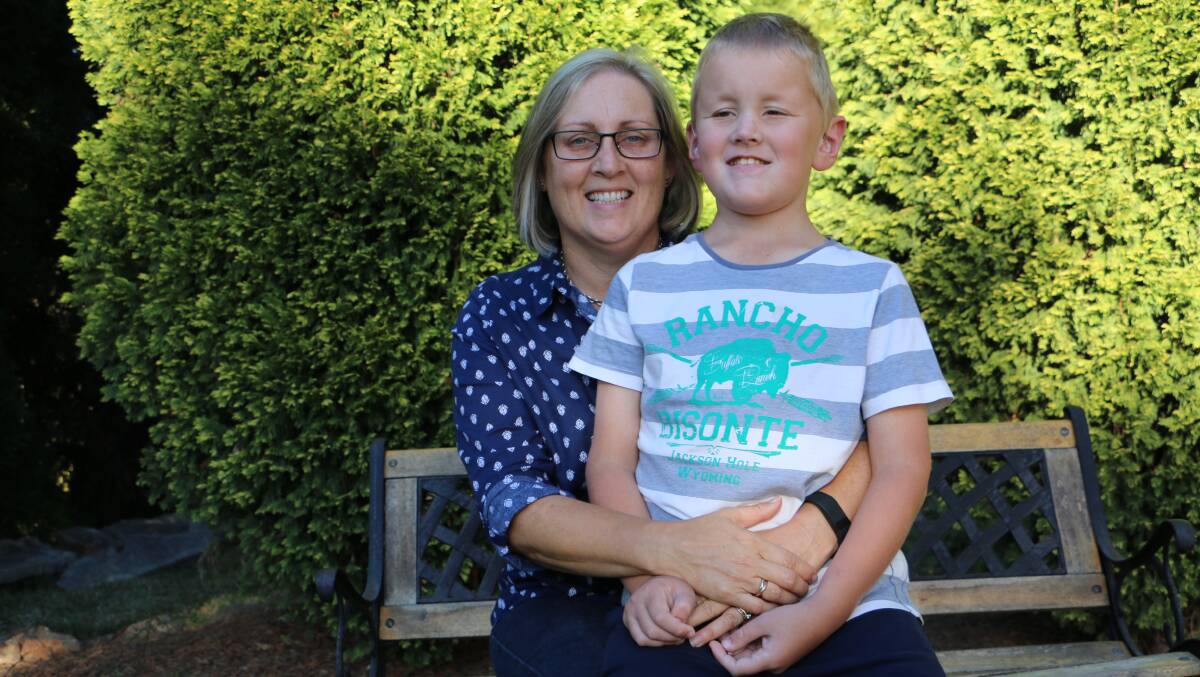 SOLID PROGRESS: Mum Roslyn Wyburn said Luke, 11, has made great progress since he was born with a hearing impairment. She praised The Shepherd Centre for its help. Picture: Ellie-Marie Watts