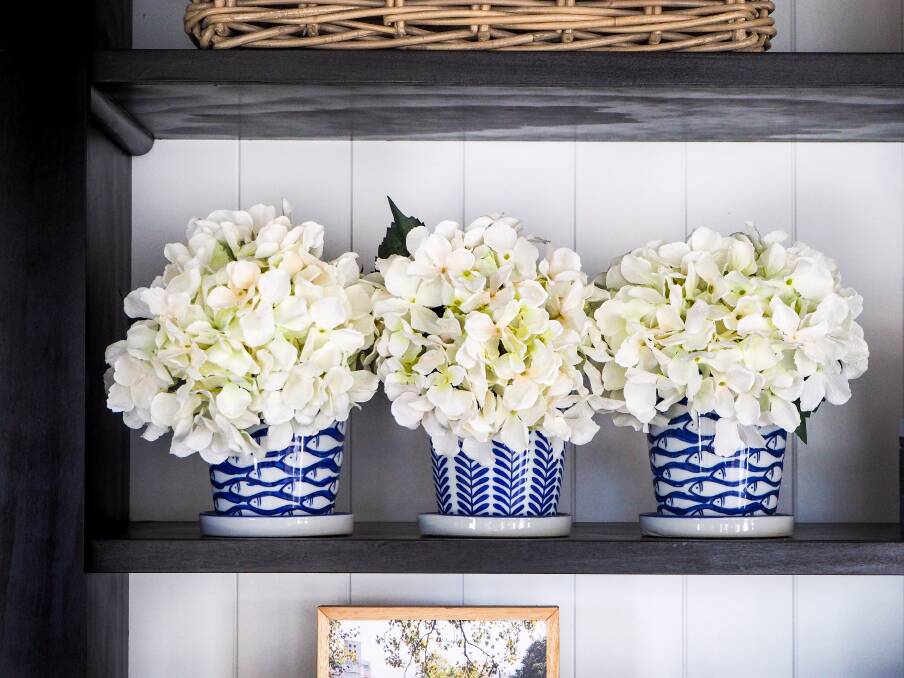 Display real or faux blooms in groups of three. Photos: Hayley Little @mumlittleloves
