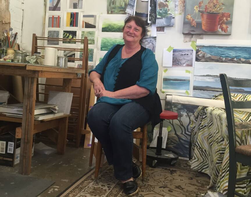 PURSUIT: Leslie Duffin in her studio at Newcastle Community Arts Centre where she paints and makes jewellery. 