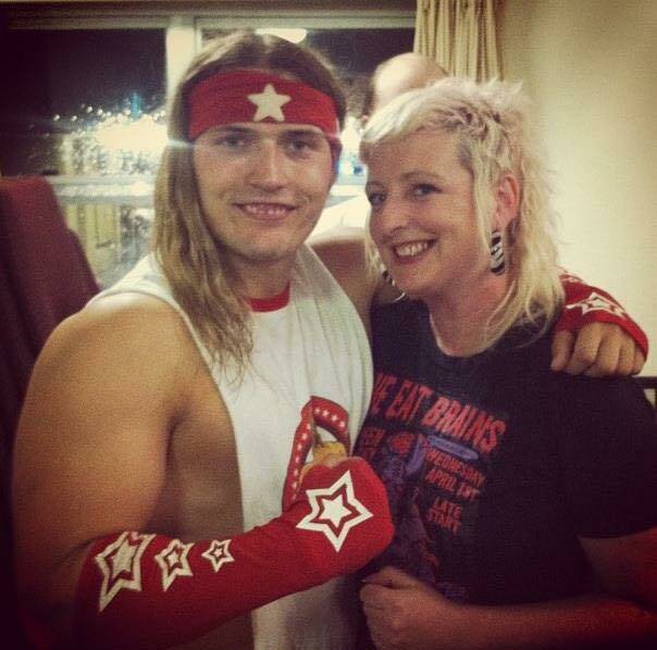 SOMETHING FISHY: Pro wrestler Iron Jay pictured with Fiona Whitton. 