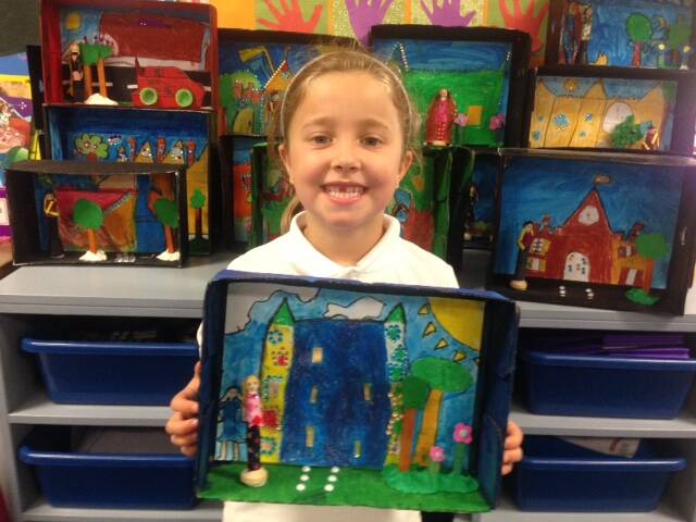 Year 1 student Genevieve Marsh with one of her artworks.