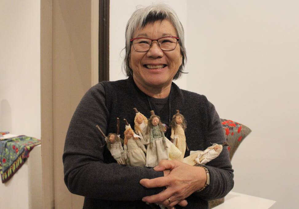 HANDMADE: Wilma Simmons with some of the dolls she has made as part of the Stitched-Up exhibition. 