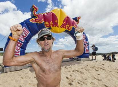DETERMINED: Stu Adams at the finish line of last year's soft sand challenge. 