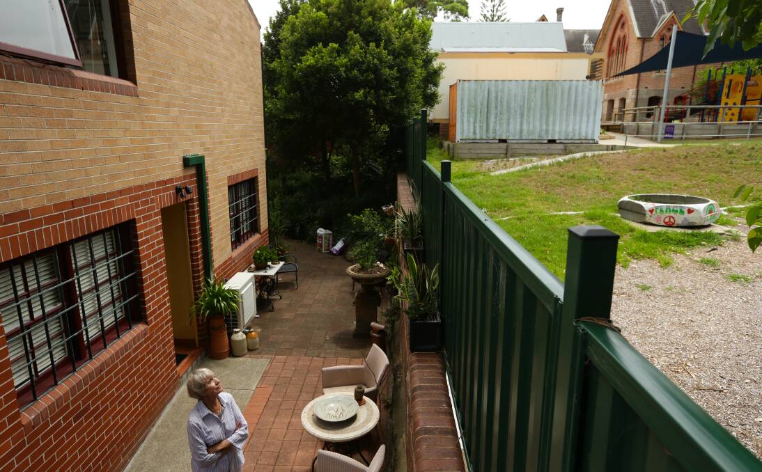 Worried: Newcastle East Public neighbour Norma Rooney said it was unclear what effect the proposed demountable would have on property values and existing stormwater drainage overflow problems. Picture: Jonathan Carroll