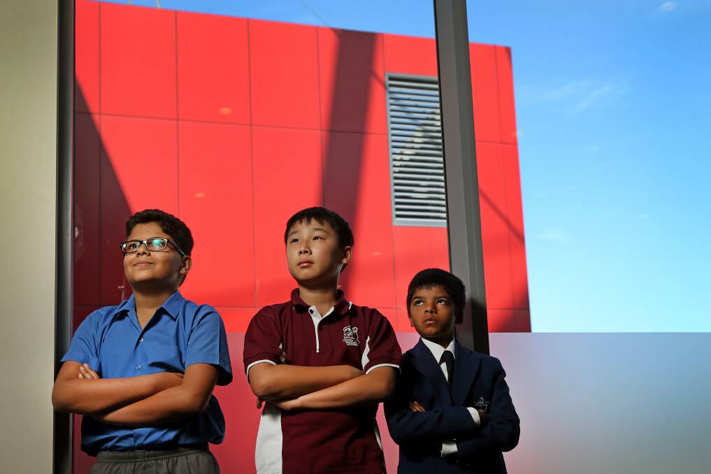 Numbers game: Students Joseph Armanios, Eric Hwang and Nidhish Kannan excelled in Newcastle Permanent's 37th mathematics competition. Picture: Marina Neil