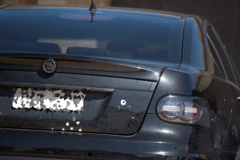 UNDER FIRE: A car parked in the driveway of a home on Conder Crescent, Metford, was sprayed with bullets in a drive-by on Monday morning.