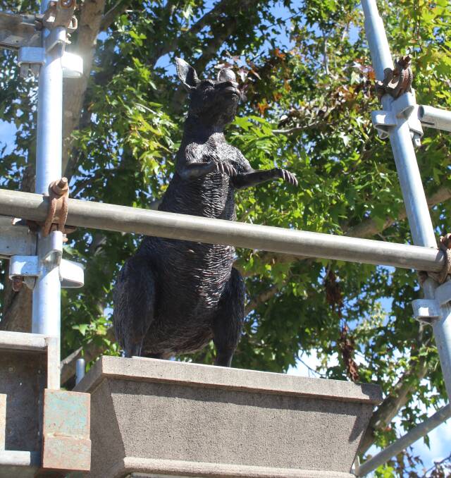 IN HONOUR: Two bronze kangaroos have been carefully crafted to again sit atop the gates at Lambton Memorial Park.