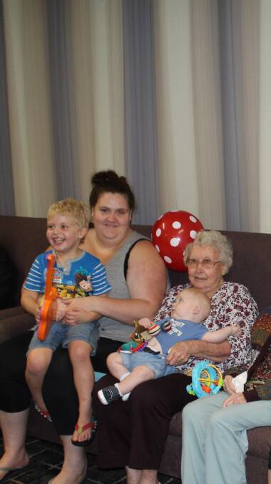 FUN AND LAUGHTER: From left, Kayden Merz, 4, Samantha Merz, Marie Osland, 84, and Xavier Walker, four months, at SummitCare Wallsend's intergenerational playgroup.