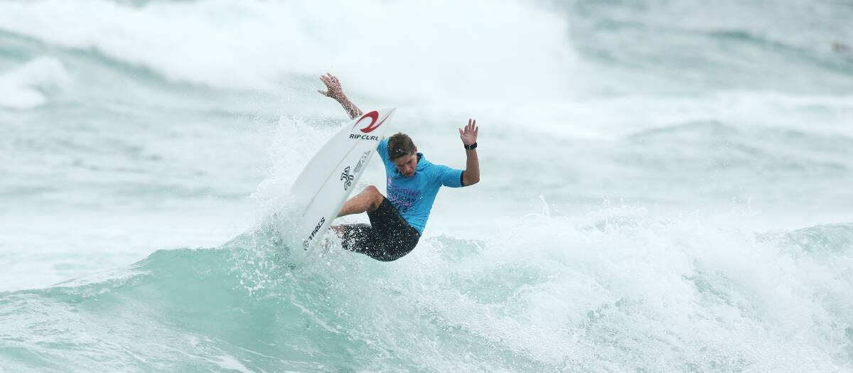 Morgan Cibilic smashes the lip in his effort for Merewether Boardriders.