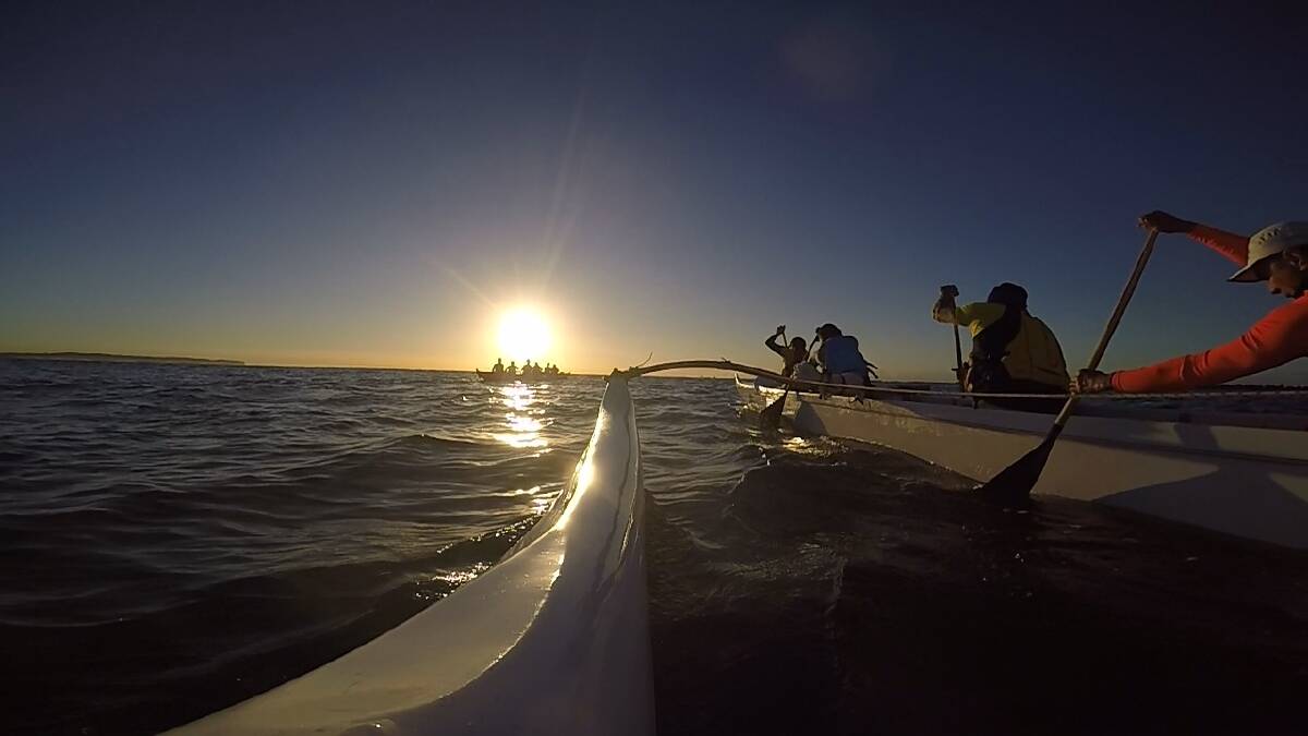 SUNRISE: Morning paddles through Swansea Channel are one of the highlights of The Lakes Outrigger Canoe Club training.