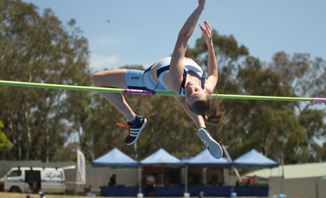 GOOD FORM: Adamstown's Emily Whelan earned a silver medal in the under-16 girls' high jump on Saturday. Picture: David Tarbotton