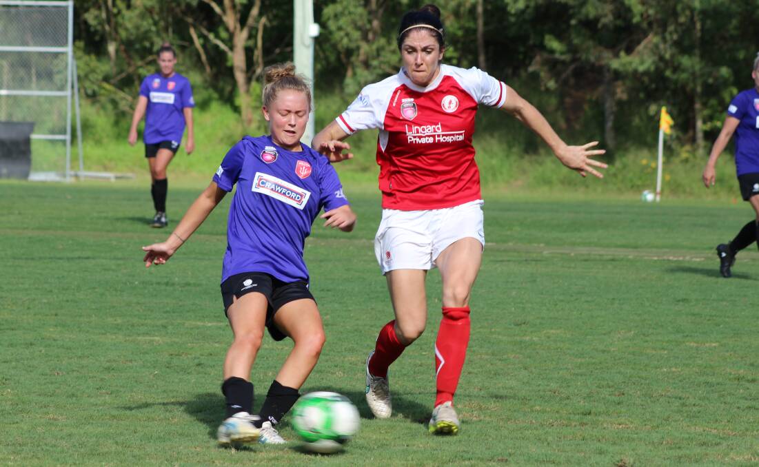 IMPACT: Holding midfielder Jane McDonald, right, controls the tempo of the game for United.
