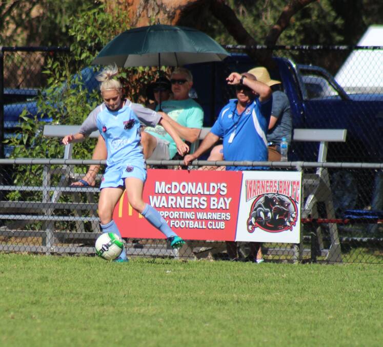 Warners Bay player Sophie Stapleford in action against Adamstown on sunday. It was first competitive game since 2014. Pictures by Renee Valentine and Jeff Keating.