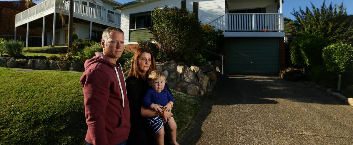CONCERN: Jade McCaig and Mark Faithfull with son Finn are considering selling their home and moving into the enrolment zone for Biddabah Public School, where their daughter Niamh attends. Picture: Jonathan Carroll