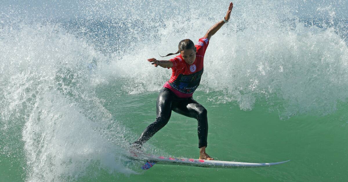 ALL CLASS: Sally Fitzgibbons carves it up at Merewether beach on her way to claiming Surfest's women's crown last year. Picture: Jonathan Carroll