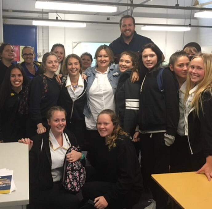 AWARENESS: Former Newcastle Knight Clint Newton pictured with Hunter Sports High year nine students at a workshop addressing domestic violence last week.