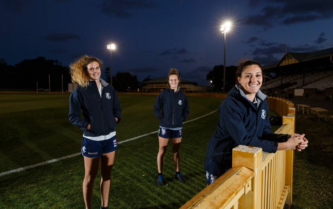 BIG WEEK: City's Sarah Halvorsen, Tayla Braithwaite and Jamee Ellis are set for their second grand final in a week. Picture: Max Mason-Hubers