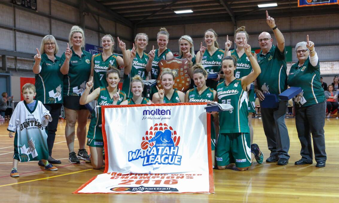 HISTORIC: Newcastle Hunters women celebrate their first championship in the Waratah Basketball League after beating Illawarra in the grand final on Sunday. Pictures by Geoff Tripp (Basketball NSW)