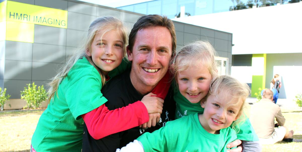 KEY FINDINGS: Philip Morgan, pictured with daughters Zoe, 10, Taylah, 8 and Bronte, 5, will use a free Hunter Medical Reseach Institute seminar this week to offer tips and strategies to families for healthier living.