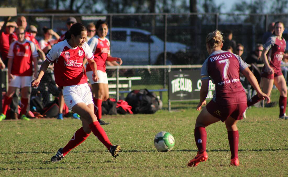 Niki Jones plays the ball for Merewether in their WPL match against Warners Bay.