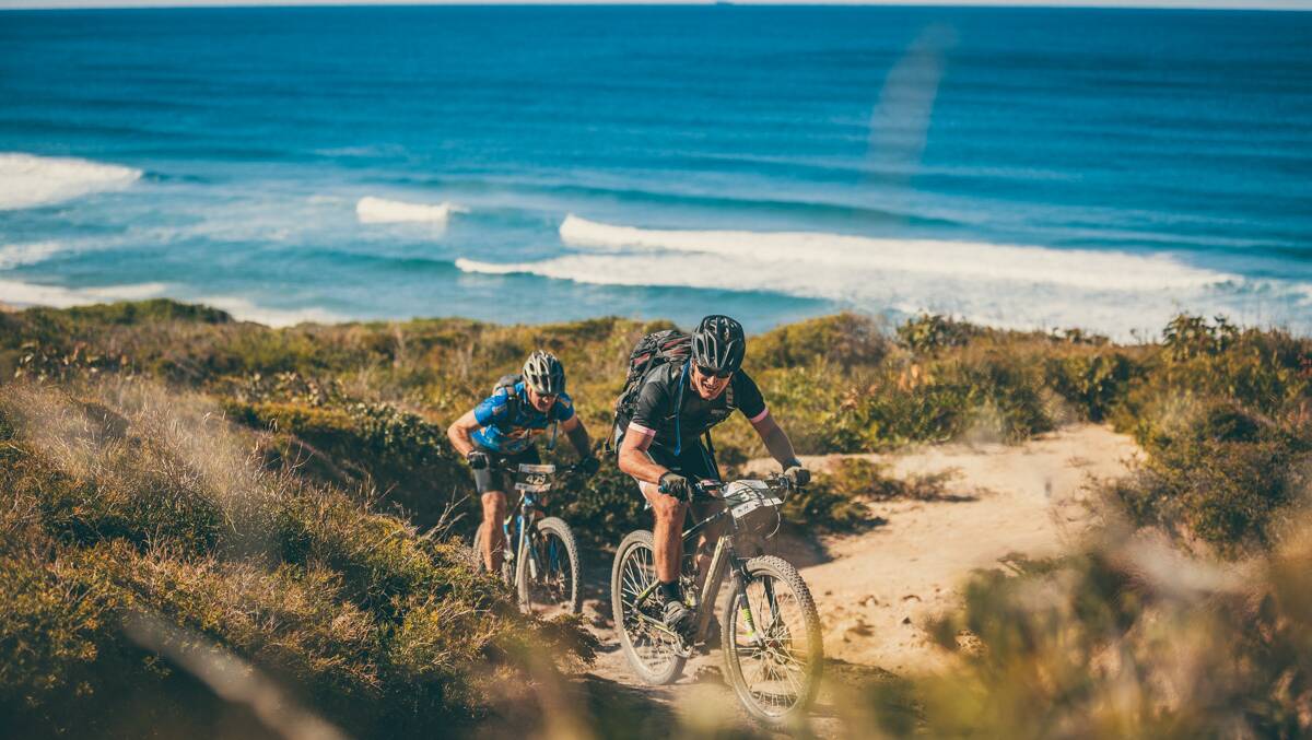 CHALLENGING: The Port to Port Mountain Bike state race fearures sandy tracks, bush backdrops and steep hill climbs between Nelson Bay and Newcastle Harbour. Picture: Flow Mountain Bike