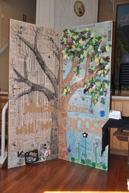 POLITICAL: Jasmine Stuart and Isabelle Cox won the 2015 secondary schools category after turning a pair of old doors into a powerful environmental statement.