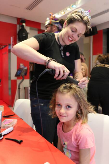 PAMPERING: Brydie Williams got her hair styled by professionals when the Starlight Express Room was turned into a salon for a day last week.