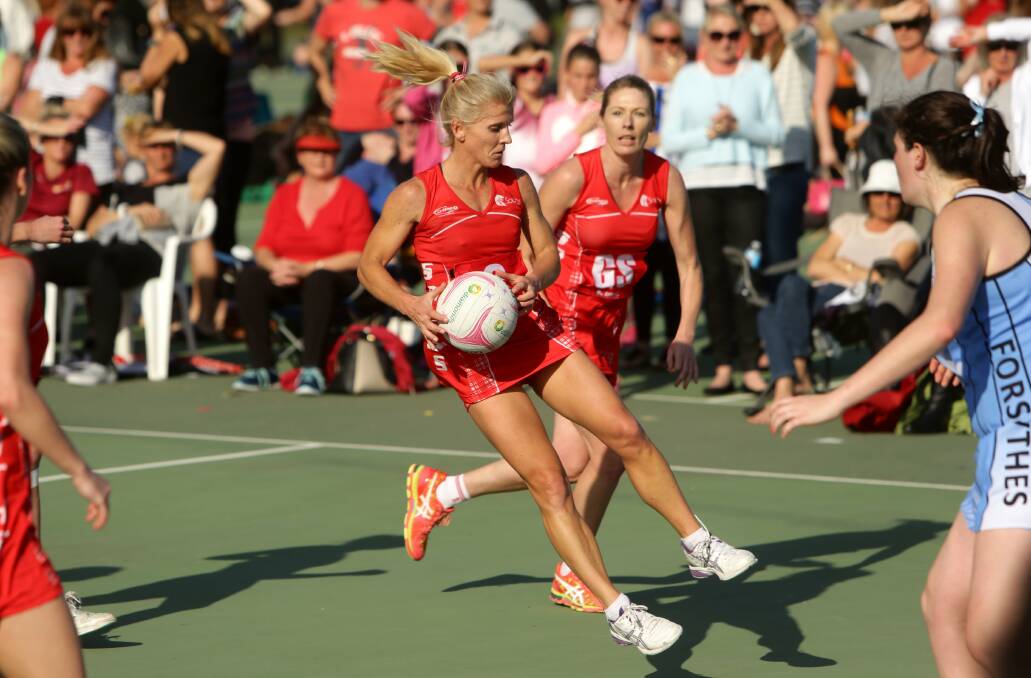 DYNAMO: Narelle Eather in action for Souths Lions during their 2015 Newcastle Netball Association grand final victory. Picture: Jonathan Carroll