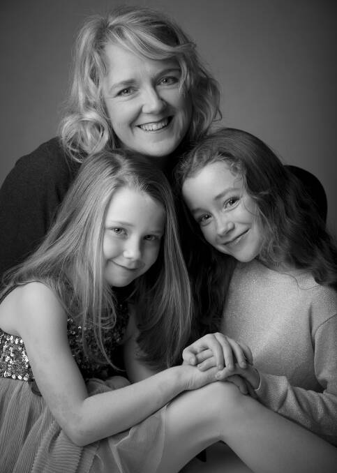 INTIMATE: Mairead Wade was photographed with daughters Jess and Darcie for National Family Portrait Month. Picture: Heath Wade