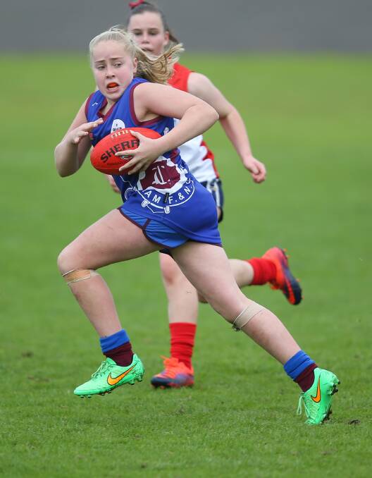 ORGANISED: Participation numbers for female AFL have exploded in recent years and researchers say kids are doing more organised activity than ever. Picture: Morgan Hancock