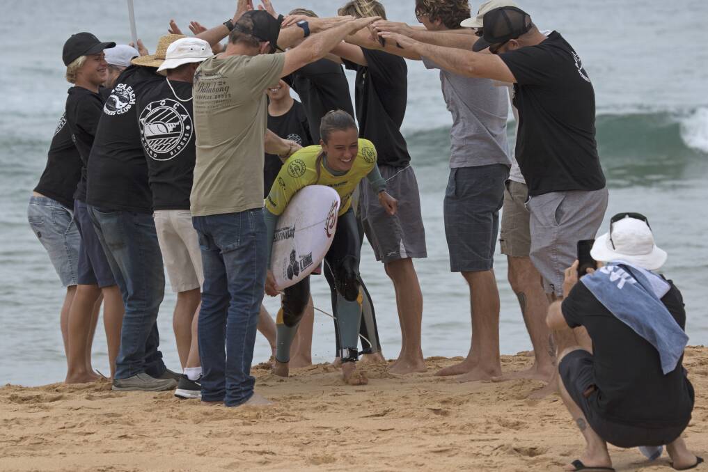 Avoca surfer Kirra-Belle Olsson coming out of the water after a stunning performance at the nudie Australian Boardriders Series. Picture: Ethan Smith / Surfing NS