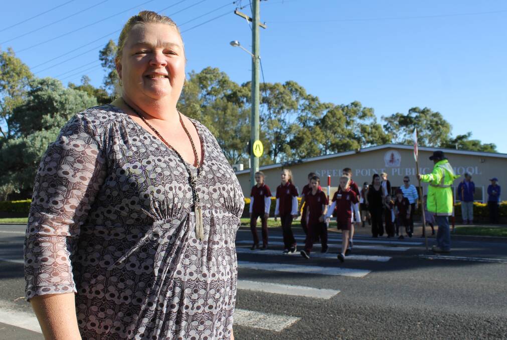 WORRIED MUM: Speers Point Public School P&C vice-president Sharon Clifford stands on the school’s Main Road crossing.