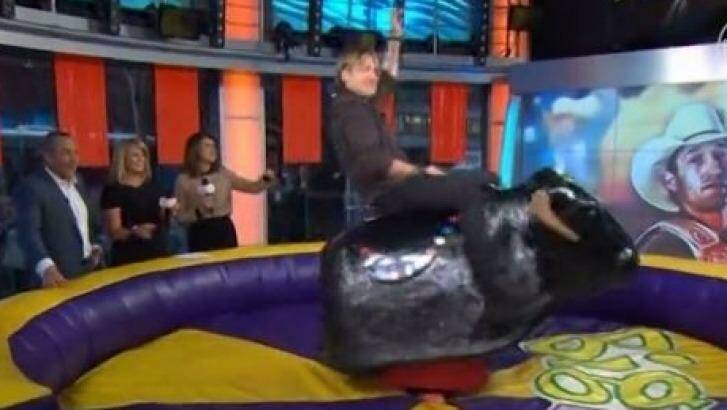 Keith Urban managed to stay on his mechanical bull for an impressive period on <i>Sunrise</i>. Photo: Supplied