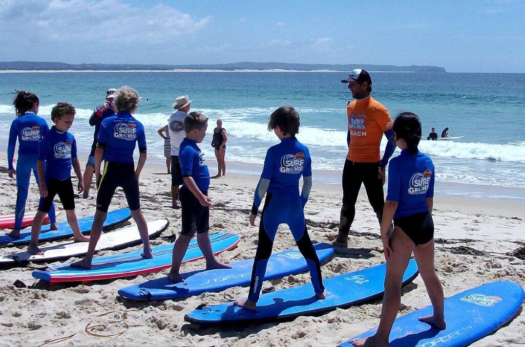 BEACH LESSON: Learn to Surf Newcastle SurfGroms hit the beach.