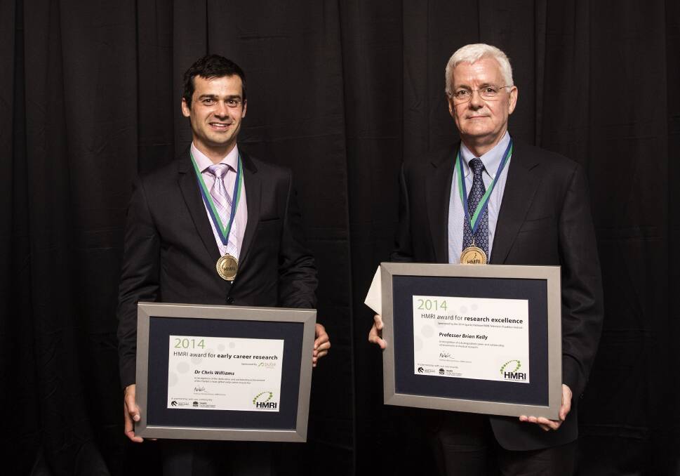 ACHIEVERS: Dr Chris Williams and Professor Brian Kelly with their awards.