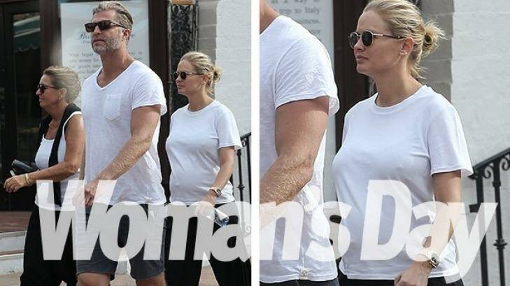 Papped: Lara Bingle talking her baby bump for a stroll in Palm Springs. Photo: Woman's Day