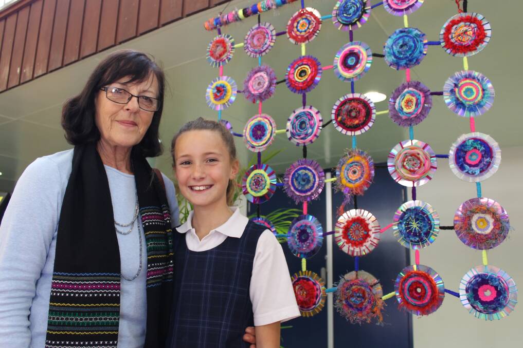 Karen Broadhurst with her granddaughter Sophia Borthwick year 5, aged 10 from Hamilton South Public School during Education Week.
