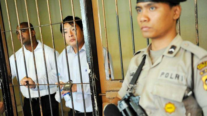 Sukumaran (left) and Chan behind bars. Photo: Antara Foto