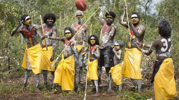 Show of support for Adam Goodes. Pictures from the opening of the 17th annual Garma in northeast Arnhem Land. Members of the Gumatj (Gumatj) clan added a red V and the no.37 to their traditional paint in support of Adam Goodes.
 Photo: Peter Eve