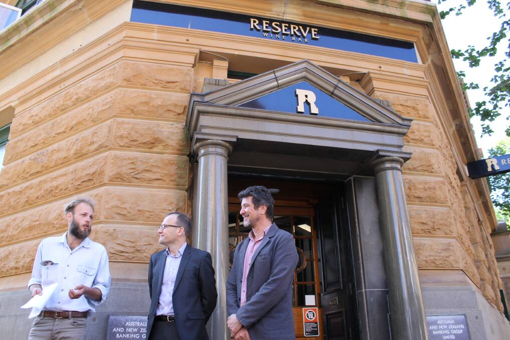 SUPPORT: Terrace Bar owner Chris Hearn with Greens federal member for Melbourne Adam Bandt and Newcastle Greens councillor Michael Osborne, outside the Reserve Wine Bar which is still open.