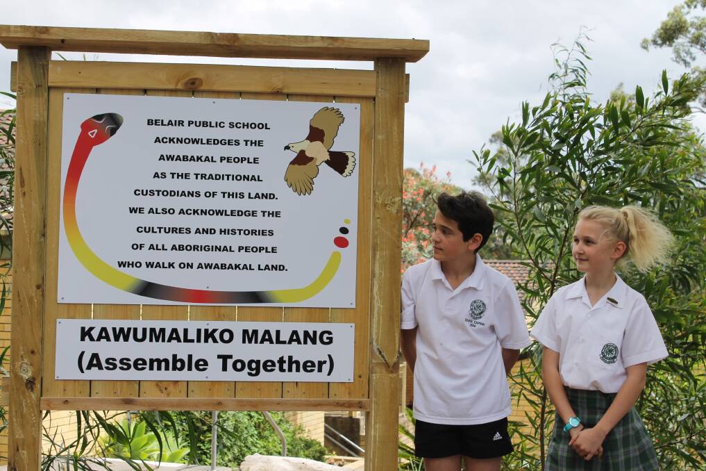 Belair Public School captains Amy and Elijah after revealing the Kawumaliko Malang garden sign.